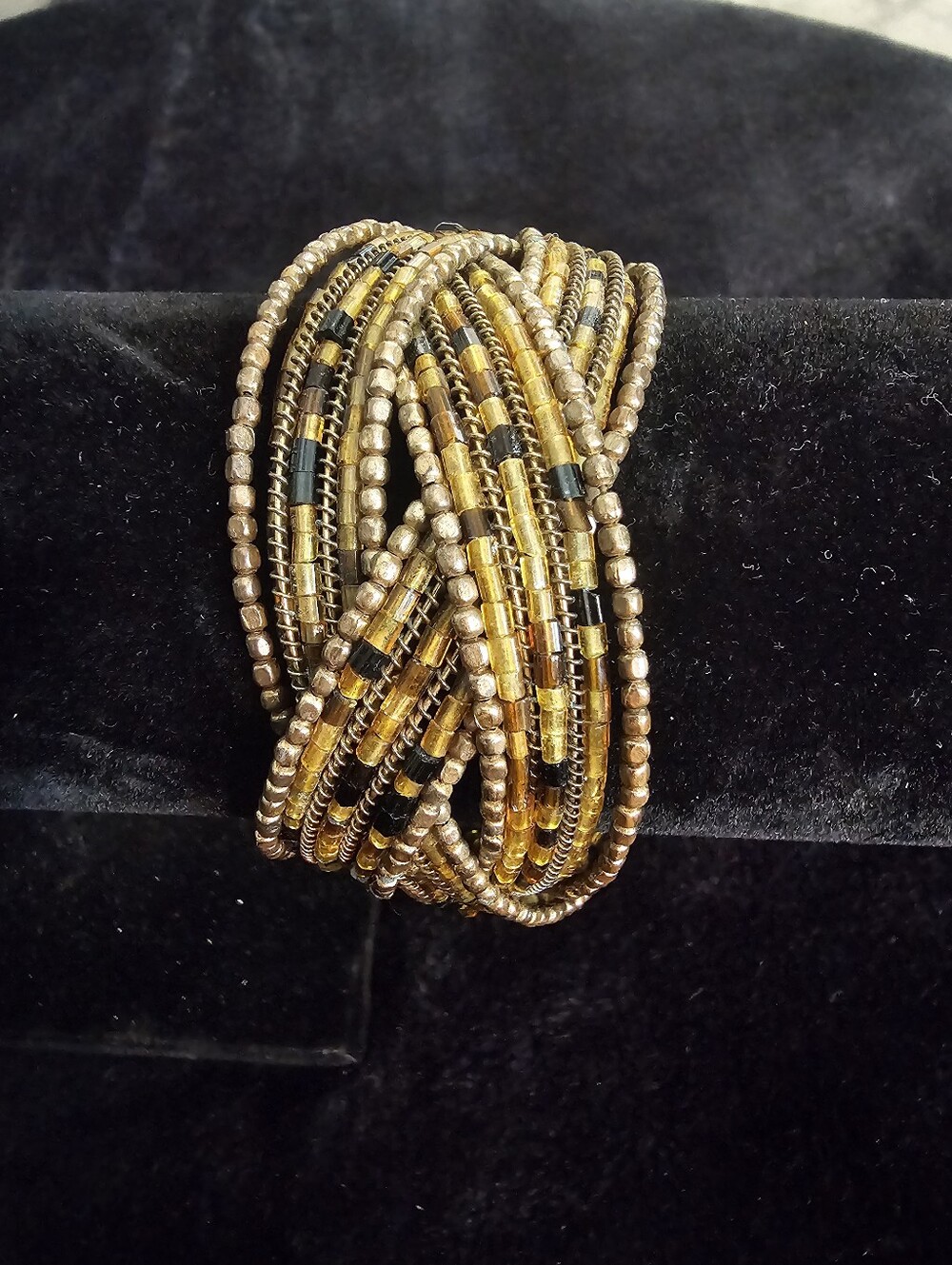 Source Unknown Gold and Amber Multi-Strand Beaded Twist Bracelet. V